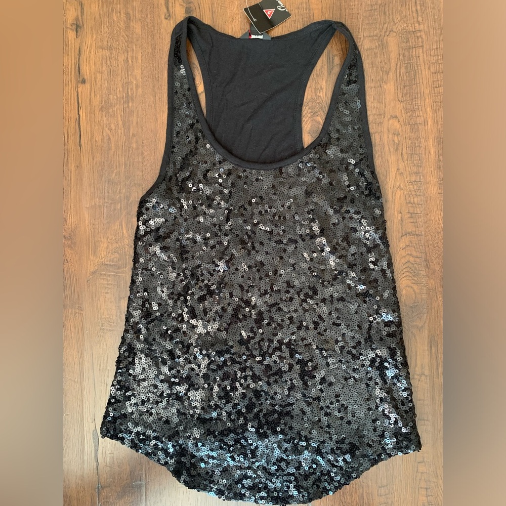 Cute black sequin tank top from Guess brand. New with tags. Size S.